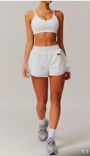 Nevafold white sports shorts with Spanx